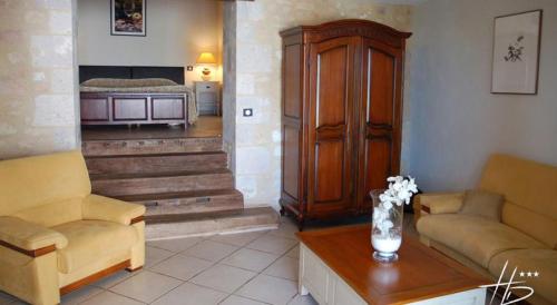 Зона вітальні в Logis Hostellerie des Ducs