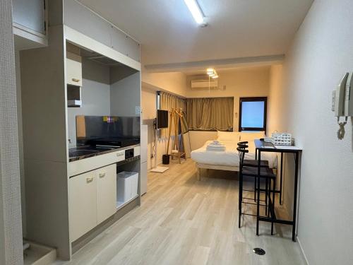 Kuchyň nebo kuchyňský kout v ubytování P-Stay広島富士見町301