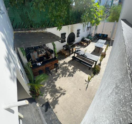 an overhead view of a patio with a restaurant at The Hostal Inn in Playa del Carmen