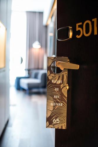 Un certificado, premio, letrero u otro documento en 65 Hotel, Rothschild Tel Aviv - an Atlas Boutique Hotel