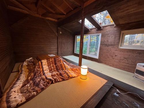 En eller flere senge i et værelse på Playhouse Conifer - Vacation STAY 24021v