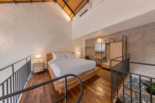 En eller flere senge i et værelse på ND LOFT 2 by Kasta Hospitality