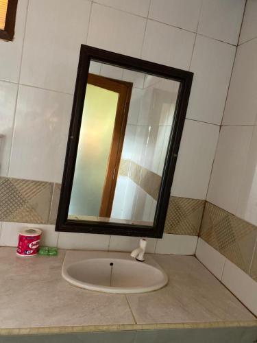 Ванная комната в MAHADING cottages