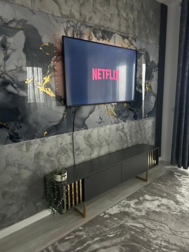 Et tv og/eller underholdning på Unirea Luxury Residence