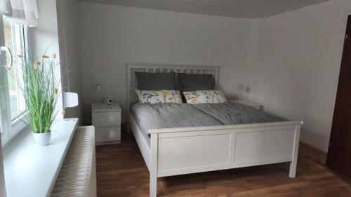 Postel nebo postele na pokoji v ubytování Ferienwohnung Heidfellersch