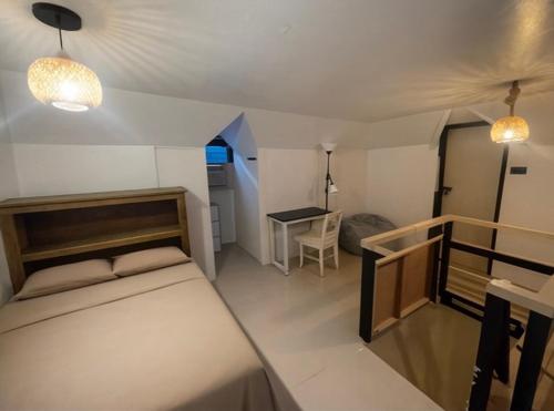 En eller flere senge i et værelse på Shaka Soul Siargao