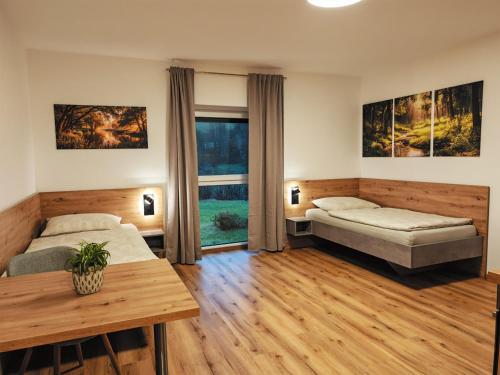 Ένα ή περισσότερα κρεβάτια σε δωμάτιο στο Pani's Gästezimmer