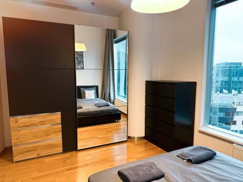 En eller flere senge i et værelse på Panoramic Sea View - 12th floor