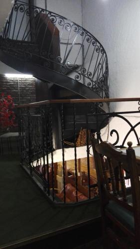 a bird cage with food inside of it at Hotel Gaviota in Montevideo