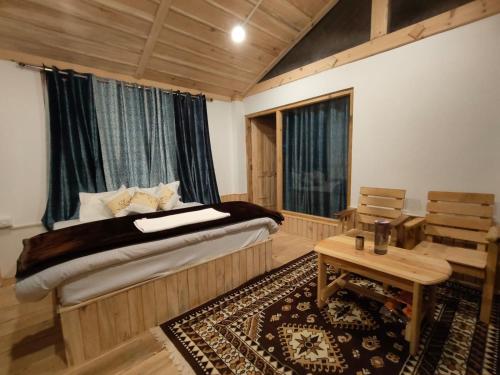 Ένα ή περισσότερα κρεβάτια σε δωμάτιο στο Shreya cozy hut