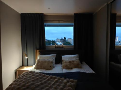 Letto o letti in una camera di ArticLoft Kemi