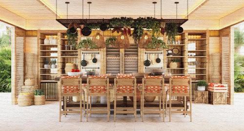 a dining room with a table and chairs at Alila Mayakoba in Playa del Carmen