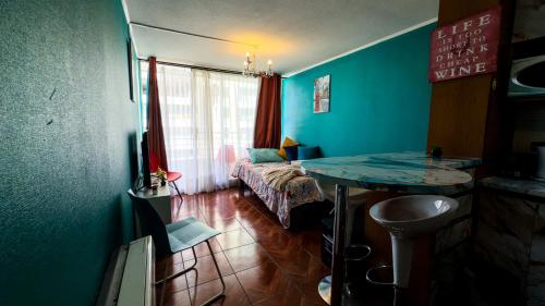 Кровать или кровати в номере Piscina Plaza de Armas Late Check in