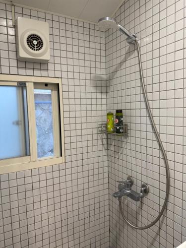 Ένα μπάνιο στο 山城背包客棧