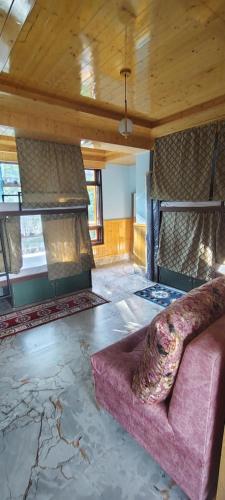 Posezení v ubytování Cosmic Buddha Bnb