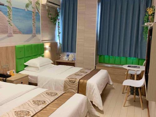 Ένα ή περισσότερα κρεβάτια σε δωμάτιο στο 7 Days Inn Changzhou North Station