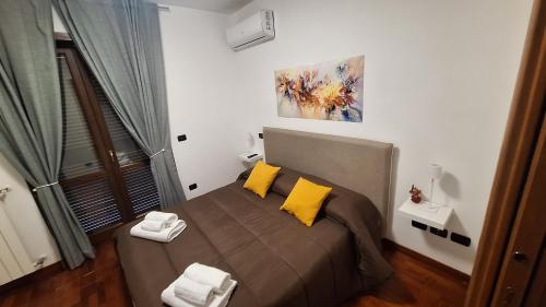 Ένα ή περισσότερα κρεβάτια σε δωμάτιο στο dolce dimora