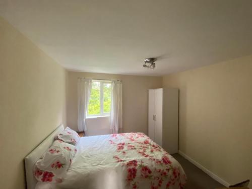 a bedroom with a bed and a window at Friars terrace in Stafford