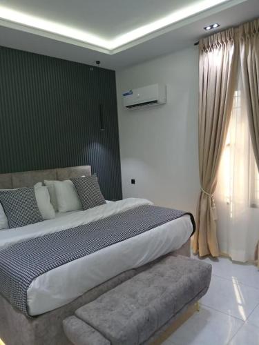 Ένα ή περισσότερα κρεβάτια σε δωμάτιο στο Deliz Premium Luxury