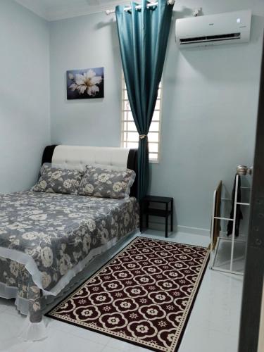 Postel nebo postele na pokoji v ubytování Che Puan Homestay Baling - 2 unit house with kids pool