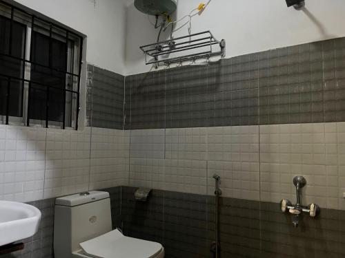 Ένα μπάνιο στο Hotel O by OYO BAHINI