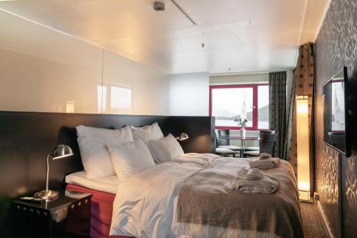 Una cama o camas en una habitación de Home Hotel Arcticus