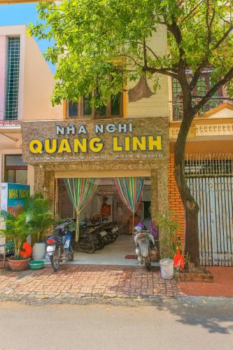 a entrance to a gym with motorcycles parked outside at Quang Linh Motel Thanh Hóa in Thanh Hóa