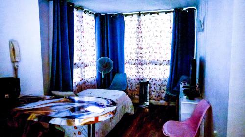 Postel nebo postele na pokoji v ubytování Santiago Centro 2 dormitorios check in tardío