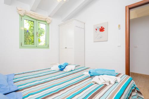 Postel nebo postele na pokoji v ubytování Sa Plana de Baix