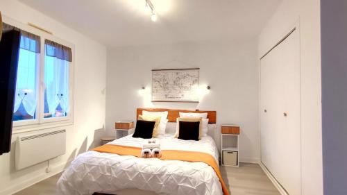 En eller flere senge i et værelse på Galets Blancs