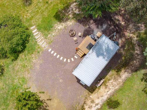 an overhead view of a solar panel in a yard at Cygnet Valley Hideaway by Tiny Away in Cygnet