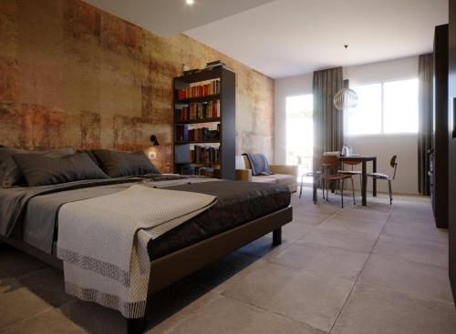 Giường trong phòng chung tại HB Appartamenti Suite