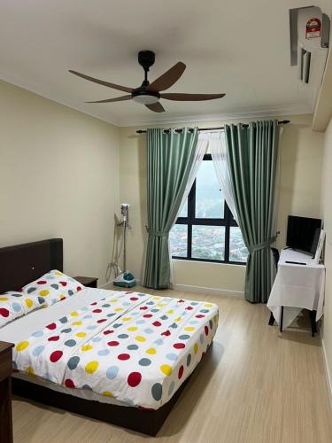 En eller flere senge i et værelse på M adora Kuala Lumpur Studio Room