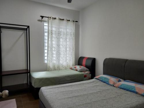 En eller flere senge i et værelse på Premium Garden Home 17 Golden Hills