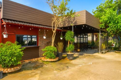 Κήπος έξω από το Cao Nguyên Đỏ Homestay - BBQ - Coffee