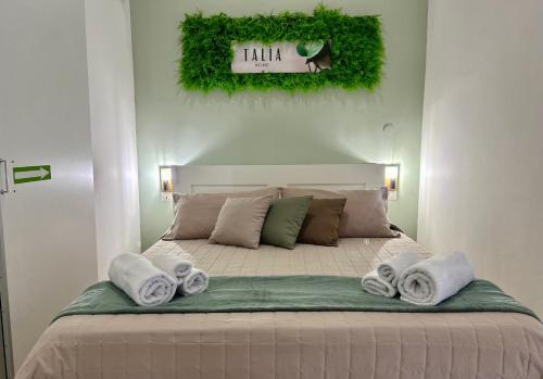 Ένα ή περισσότερα κρεβάτια σε δωμάτιο στο Talìa Home