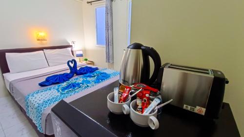 Giường trong phòng chung tại Kata Lina guesthouse