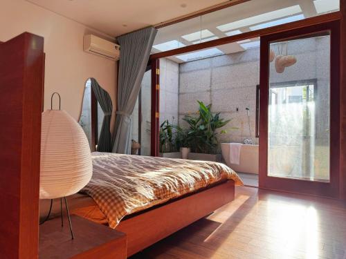 Ένα ή περισσότερα κρεβάτια σε δωμάτιο στο Le Home Phan Rang