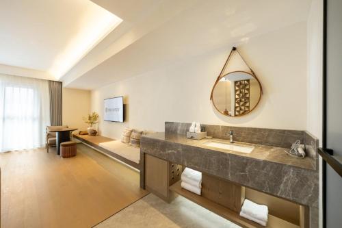 Fotografie z fotogalerie ubytování Floral Hotel Changbaishan Baihe Left Bank v destinaci Baohulinzhan