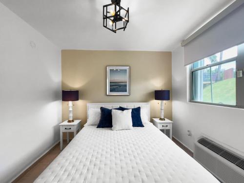 Ένα ή περισσότερα κρεβάτια σε δωμάτιο στο Sea Breeze Escape Sleeps 7 Pool in Ceiba