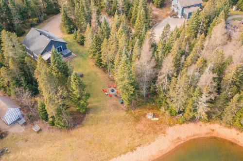 an aerial view of a cabin in a forest at Spa - Waterfront - Le Nordika in Valcartier Station