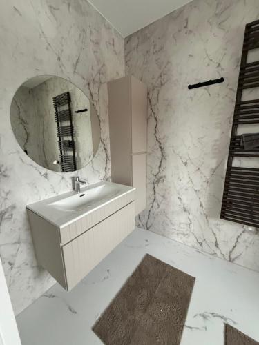 Koupelna v ubytování Bobrowa Przystań