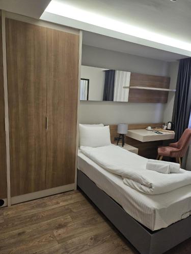 Ένα ή περισσότερα κρεβάτια σε δωμάτιο στο Frezya - Exclusively Woman