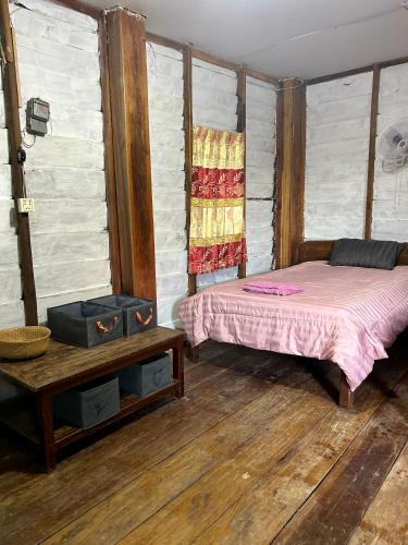 Postel nebo postele na pokoji v ubytování Bruno bungalow