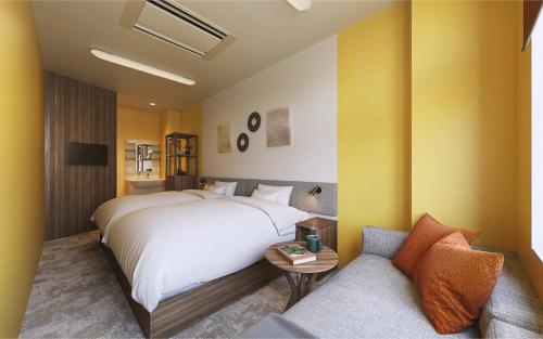 Ένα ή περισσότερα κρεβάτια σε δωμάτιο στο Red 28