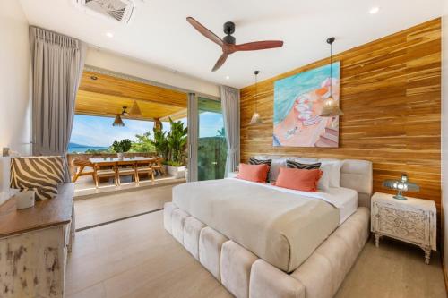Ένα ή περισσότερα κρεβάτια σε δωμάτιο στο Hidden Gem The Palms 6Br Sea View Private Pool