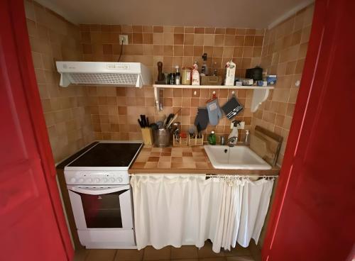 Η κουζίνα ή μικρή κουζίνα στο Les Deux Tilleuls