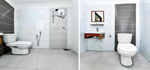 HP Usima Forest Resort Melaka في آير كيروه: حمام أبيض مع مرحاض ومغسلة