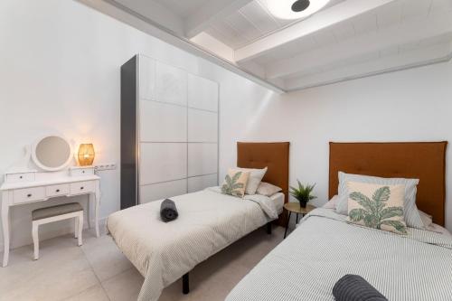 Postel nebo postele na pokoji v ubytování Casa Folias by Escape Home