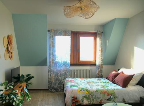 Кровать или кровати в номере L'Atelier des Tropiques